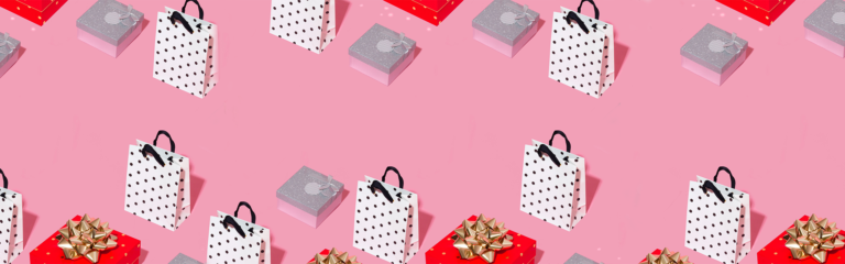 Tiled image of shopping bags and presents on a pink background