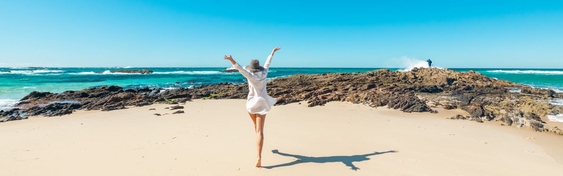 A woman on a beautiful beach at North Stradbroke Island